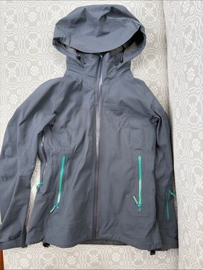 Arc'teryx Women's Dark Gray Hooded Ski Jacket with Teal Zippers